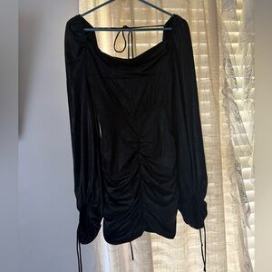Lucy in the Sky Black Ruched Mini dress, with sleeves.